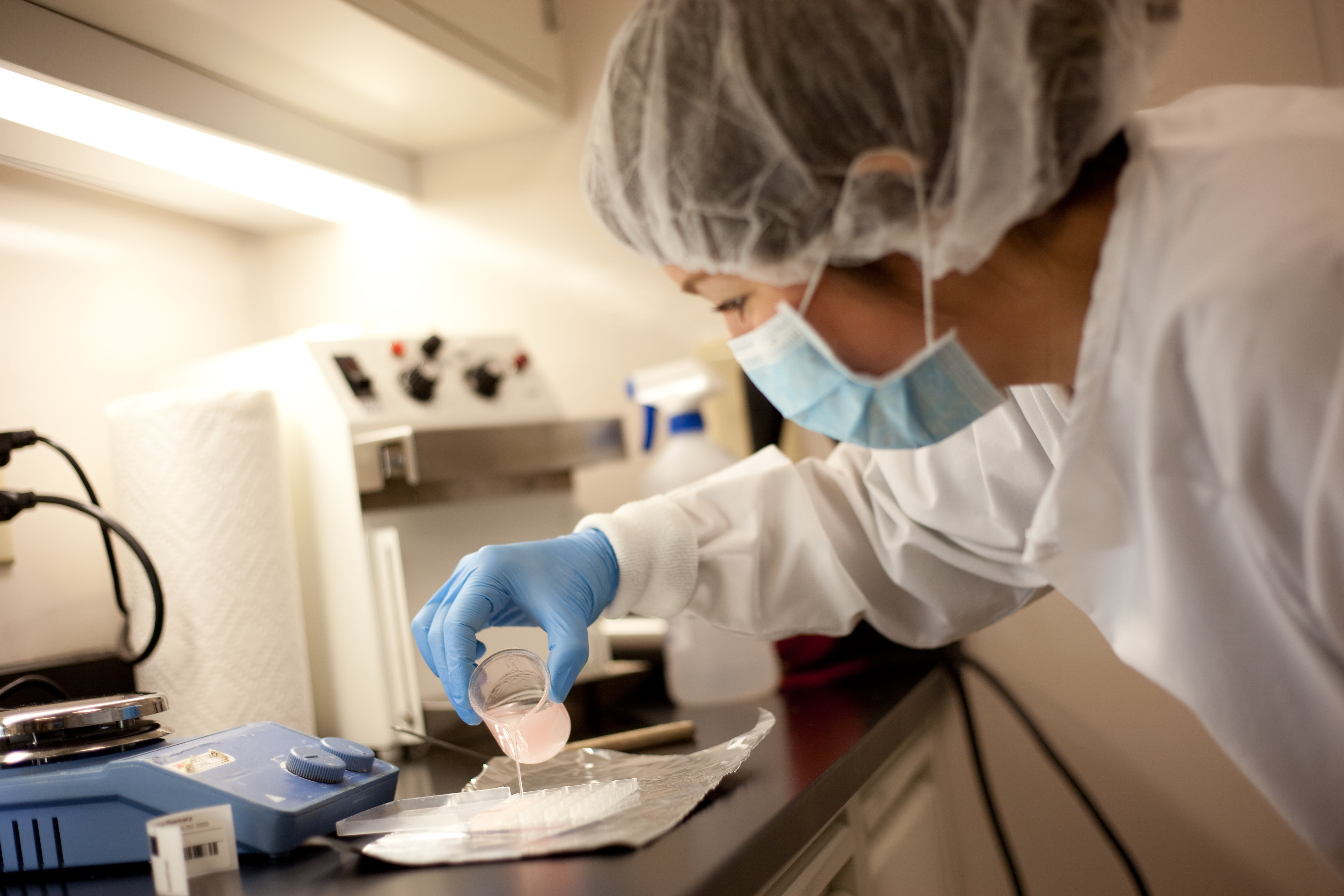 Flourish Pharmacy compounding lab in Oklahoma City — pharmacist preparing a custom formulation