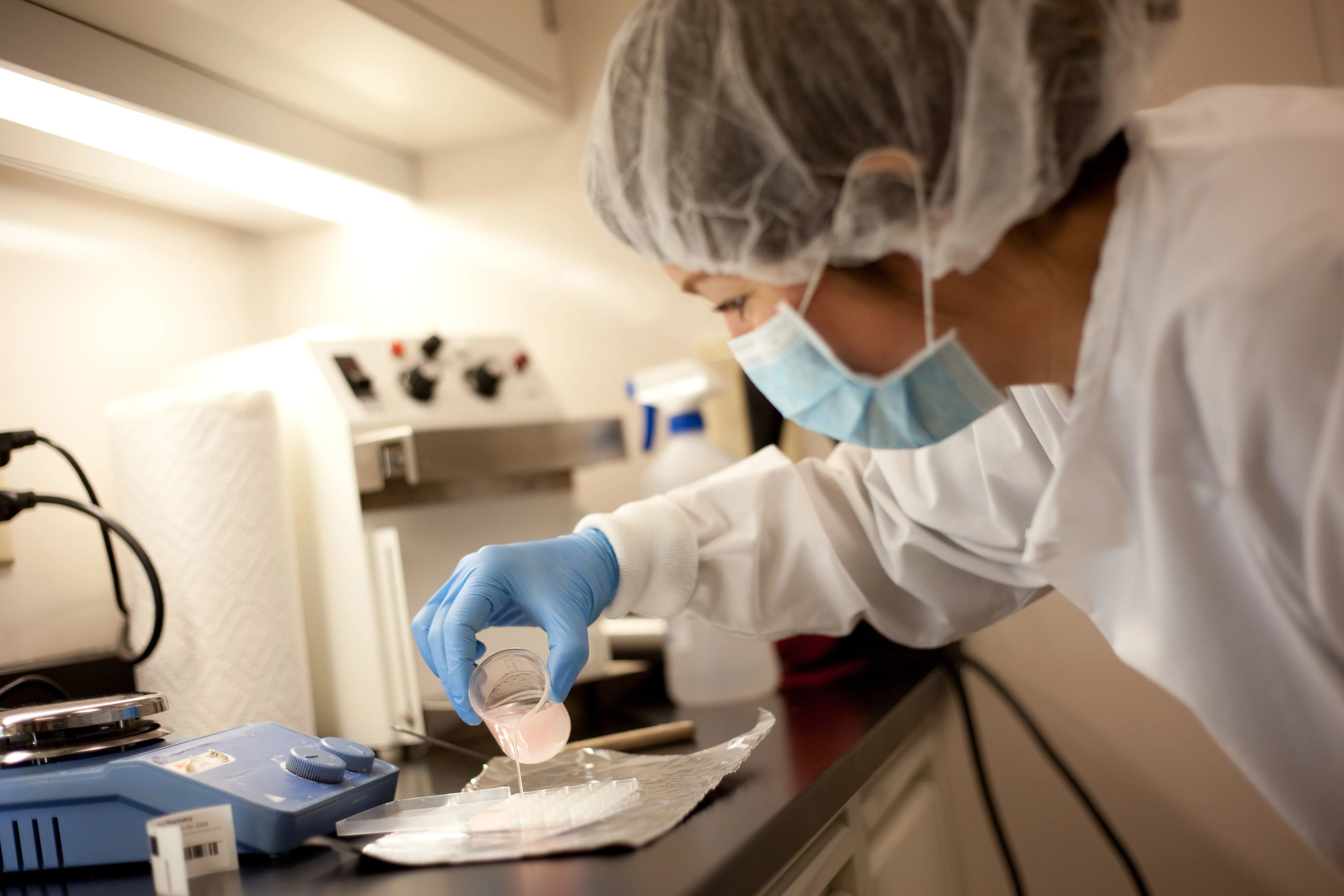 Flourish Pharmacy compounding lab in Oklahoma City — pharmacist preparing a custom formulation